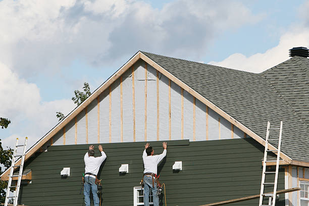Professional Emergency Siding Repair technician working in Hughesville, PA